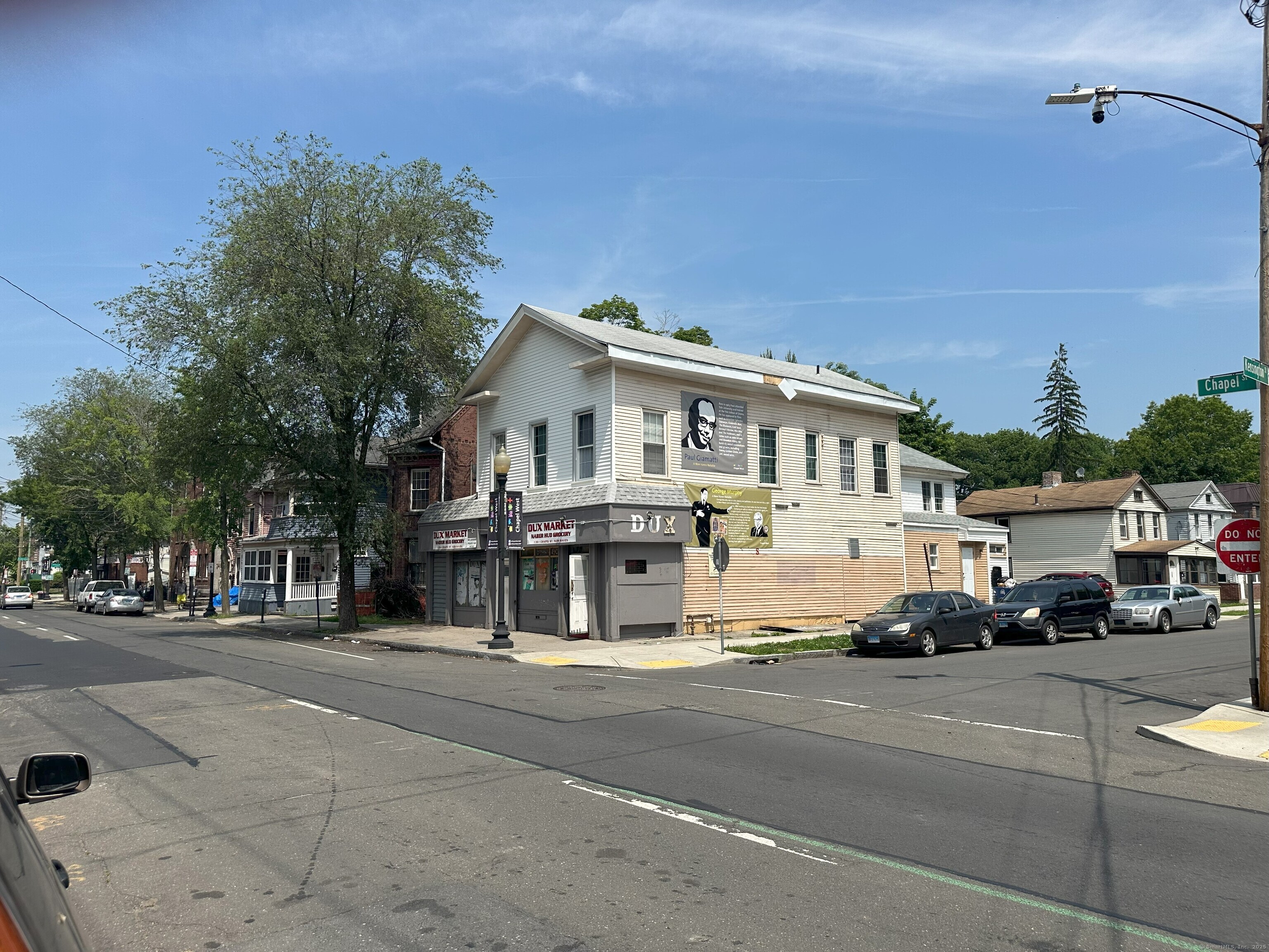 1361 Chapel Street New Haven, CT 06511 - Photo 3 of 5 a car parked on the side of the road