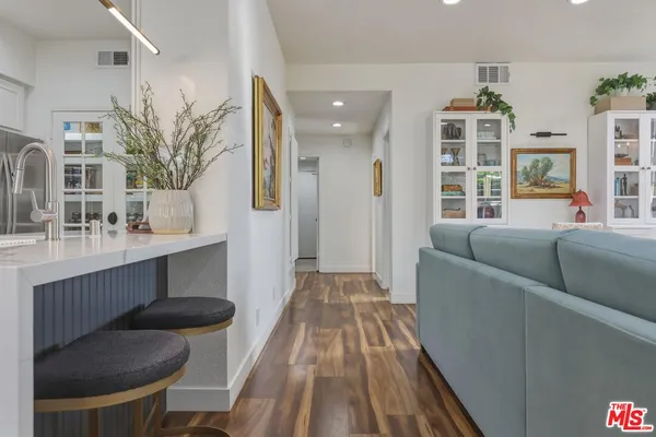 a living room with furniture and a table