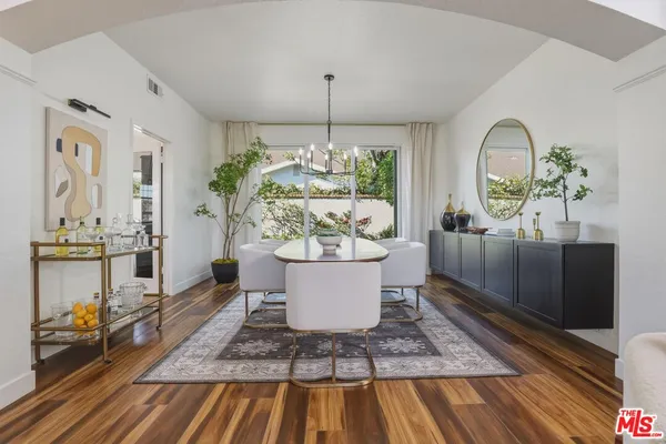a view of a living room and with a chandelier