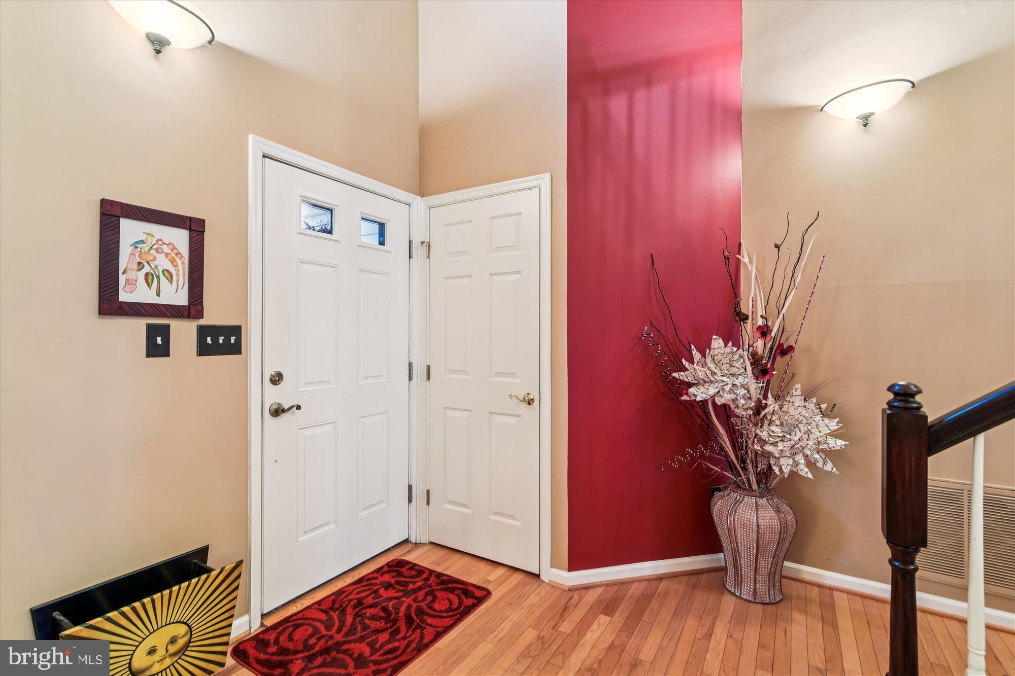 9 Brighton Street Ocean View, DE 19970 - Photo 11 of 48 a view of a hallway with wooden floor and a potted plant
