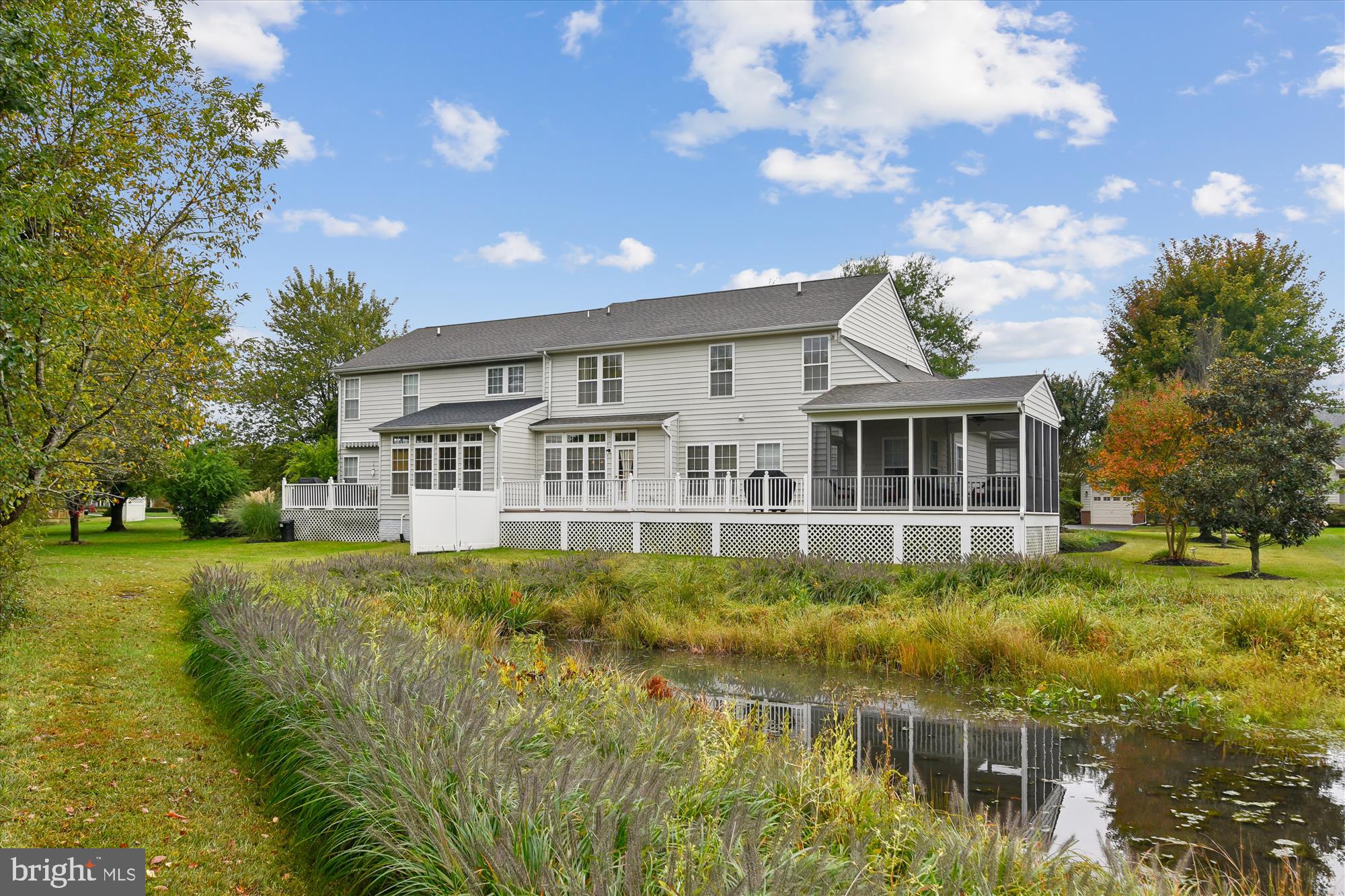 9 Brighton Street Ocean View, DE 19970 - Photo 2 of 48 a view of a house with a yard
