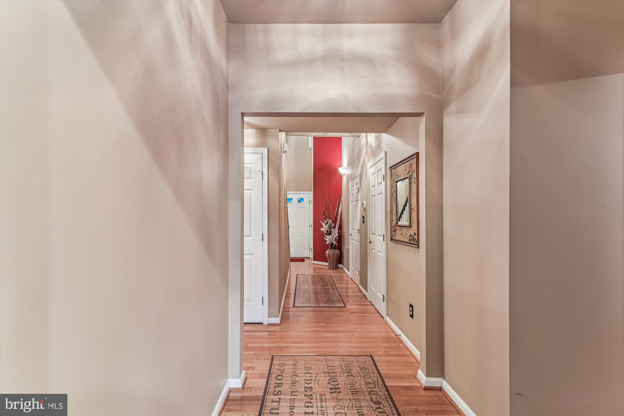 9 Brighton Street Ocean View, DE 19970 - Photo 24 of 48 a hallway with wooden floor windows and closet