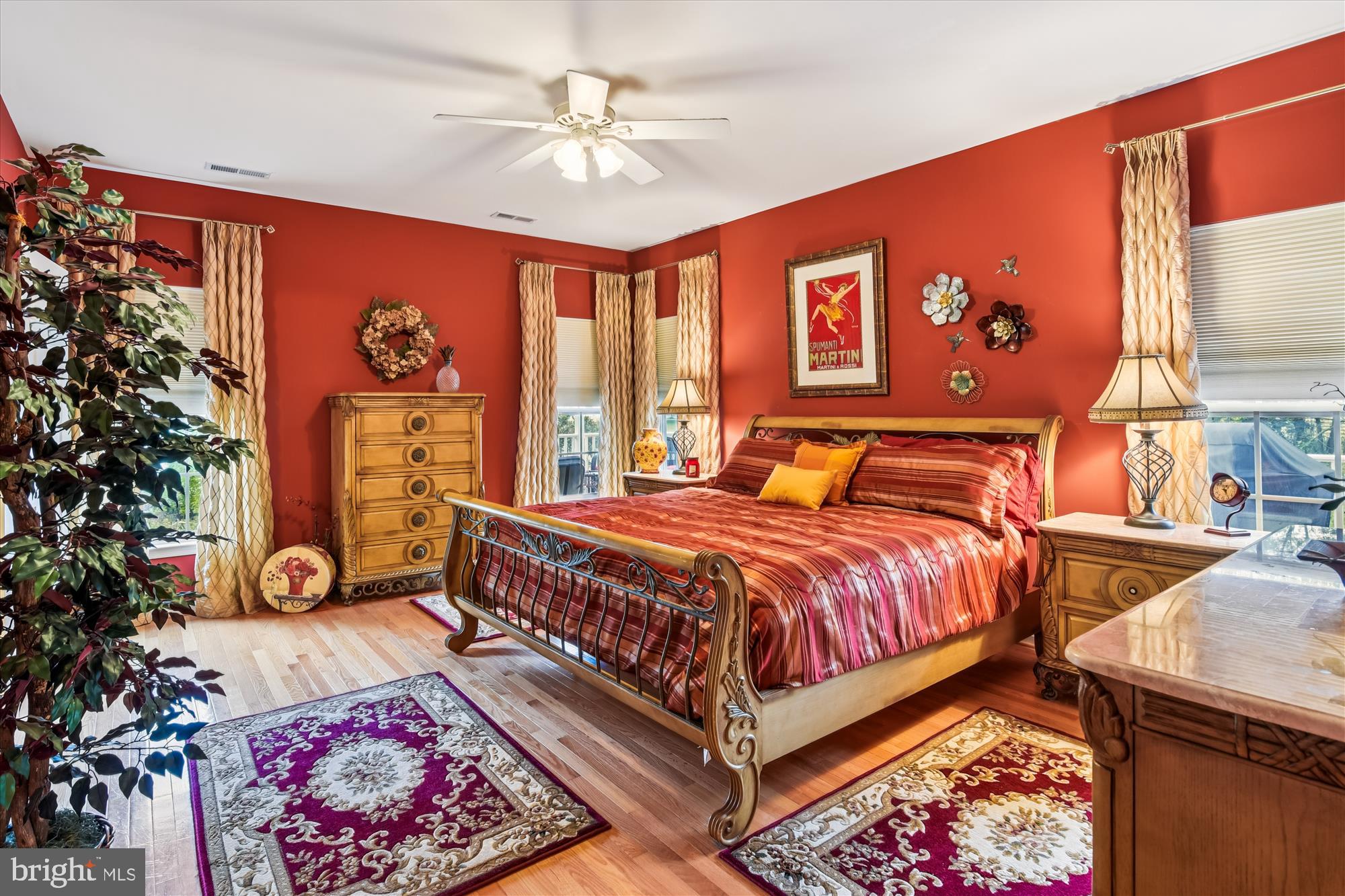 9 Brighton Street Ocean View, DE 19970 - Photo 25 of 48 a bedroom with a bed and a chandelier