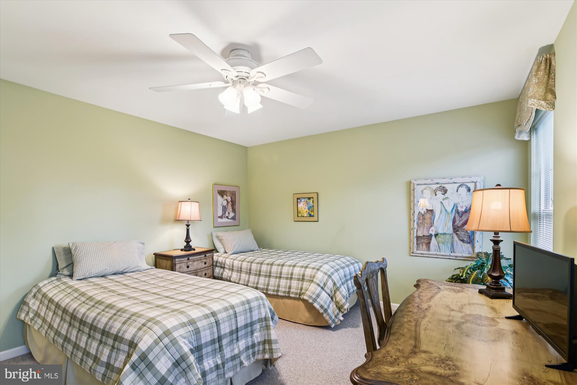 9 Brighton Street Ocean View, DE 19970 - Photo 38 of 48 a bedroom with two beds and lamps