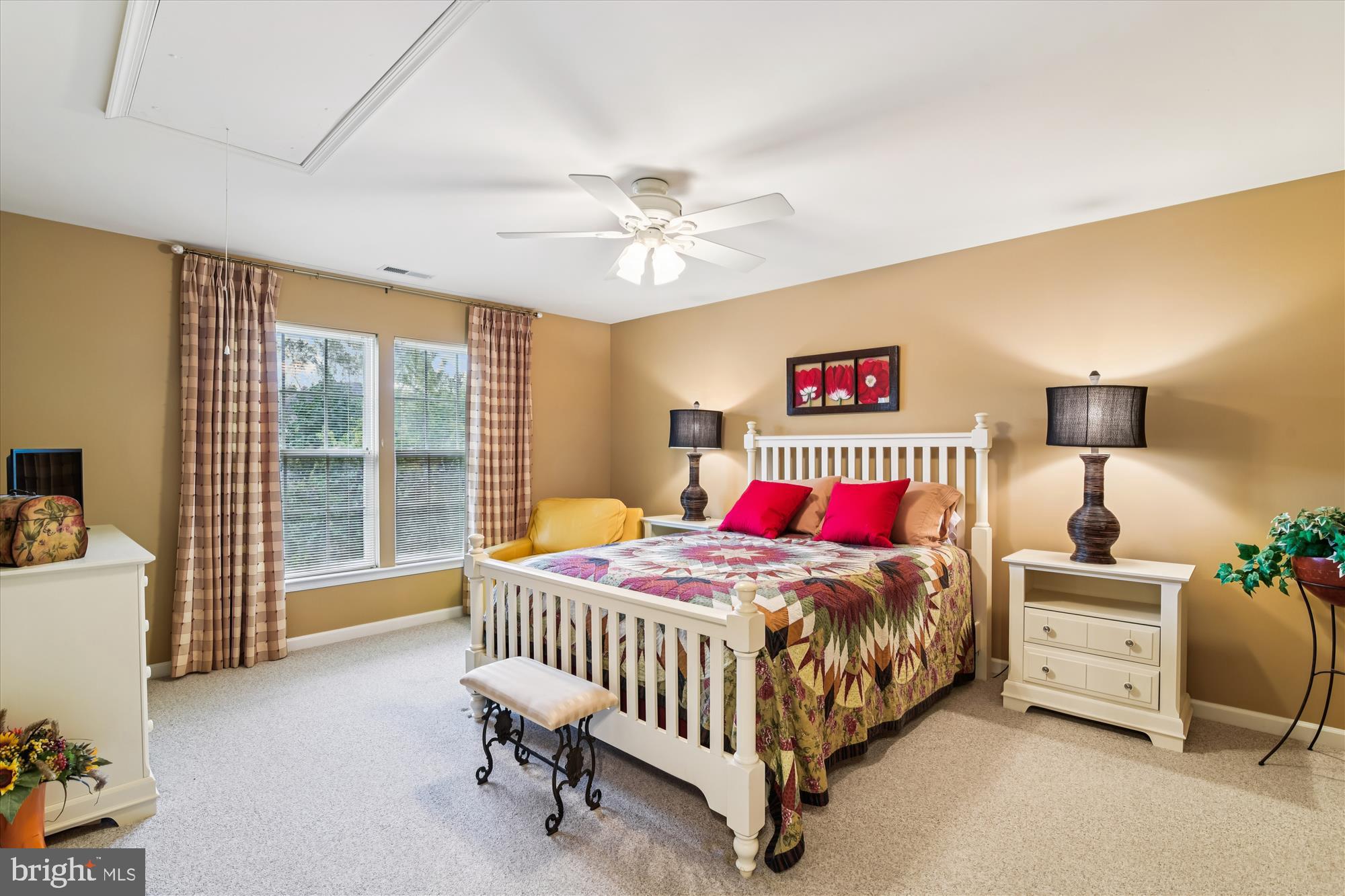 9 Brighton Street Ocean View, DE 19970 - Photo 41 of 48 a bedroom with a bed and a chandelier