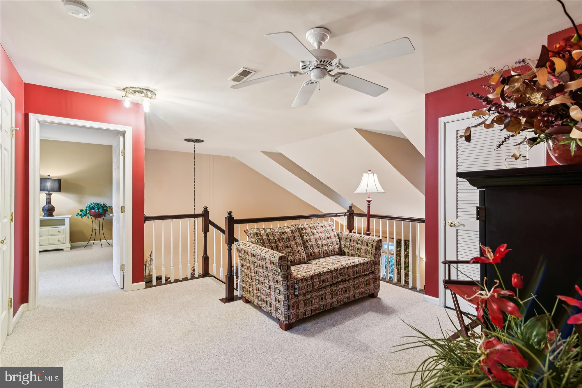 9 Brighton Street Ocean View, DE 19970 - Photo 46 of 48 a view of a hallway with a couch and a chandelier