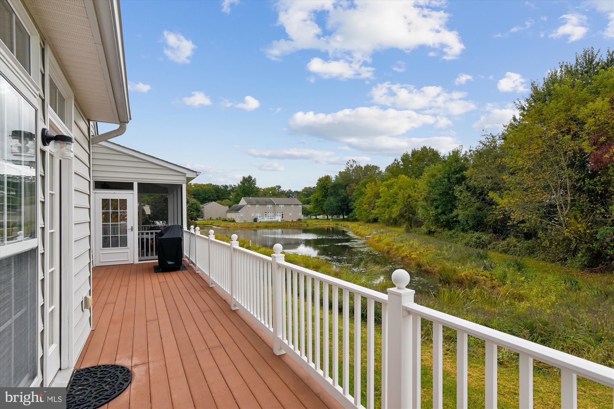 9 Brighton Street Ocean View, DE 19970 - Photo 7 of 48 a view of a balcony with wooden floor