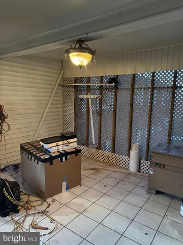a view of livingroom with hardwood floor and hallway