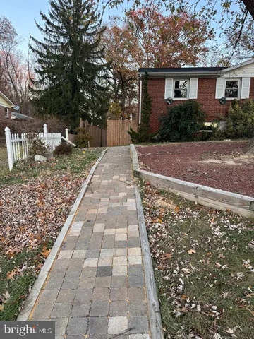 a front view of a house with yard