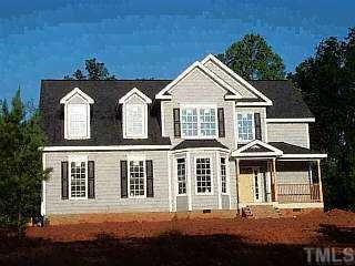 10117 Old Roxboro Road Bahama, NC 27503 - Photo 1 of 1 a front view of a house with a yard