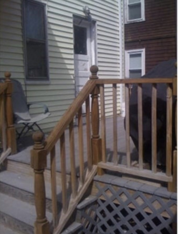 121 Main Street, Unit 1 Malden, MA 02148 - Photo 4 of 5 a view of wooden balcony