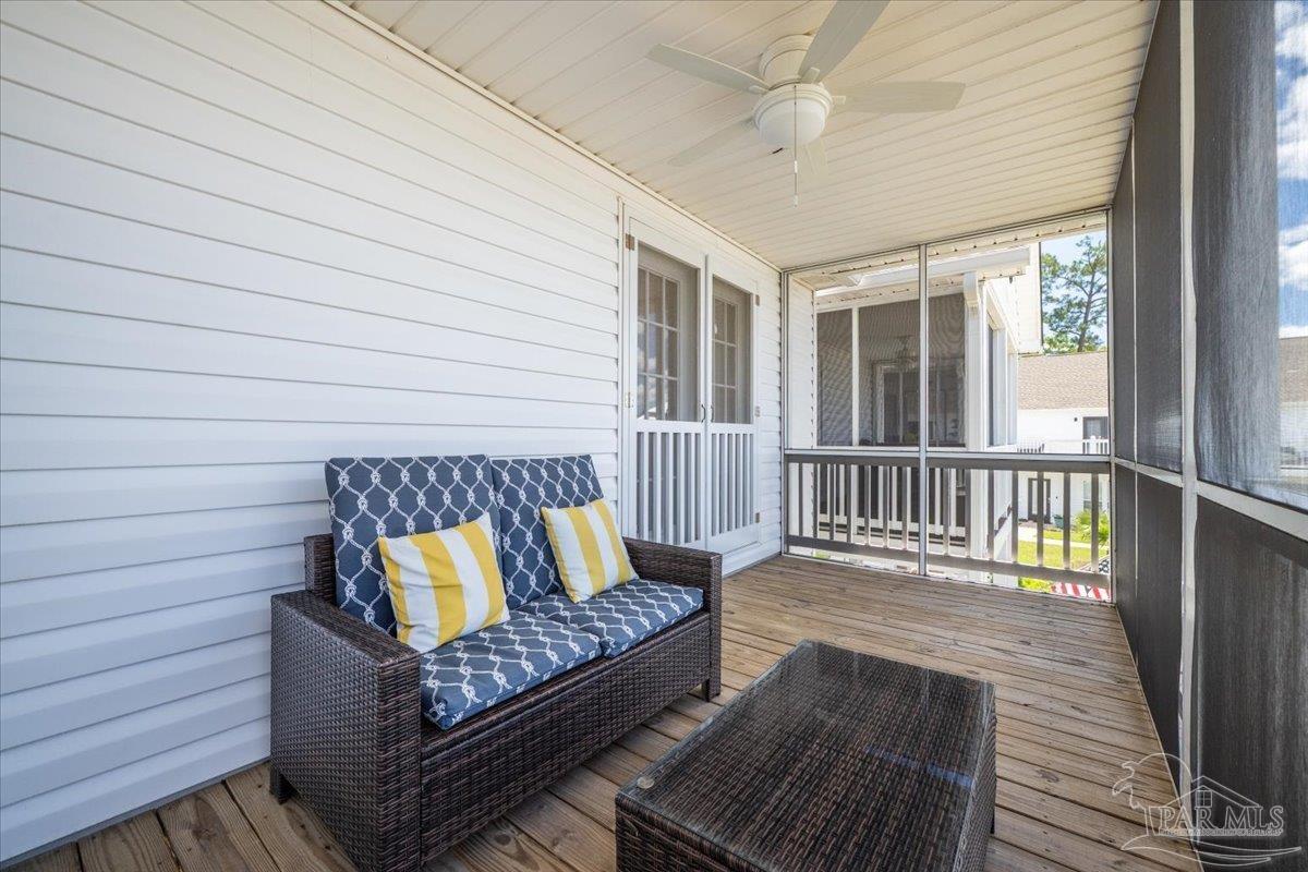26063 Canal Road, Unit 3F Orange Beach, AL 36561 - Photo 49 of 72 a view of a roof deck with wooden floor