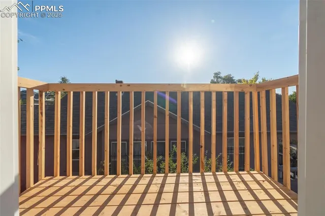 a view of a balcony with an outdoor space