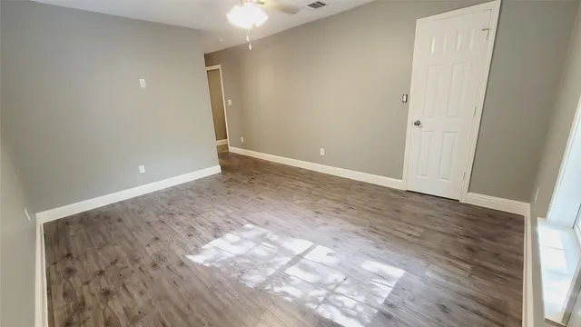 wooden floor in a hall with an entryway