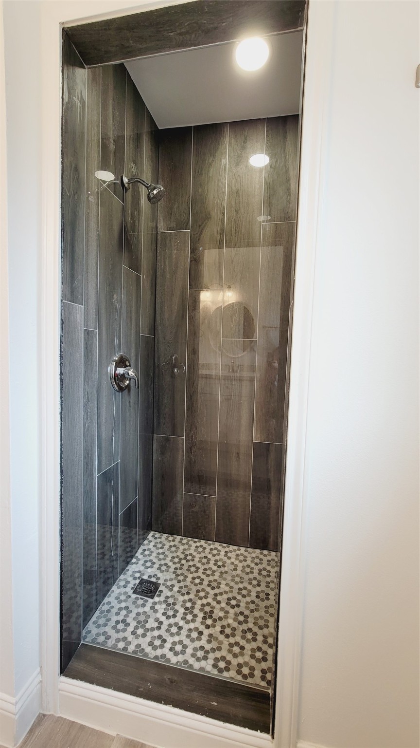 4034 Dreyfus Street Houston, TX 77021 - Photo 24 of 32 a bathroom with a shower and a sink