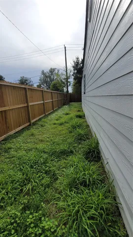 a view of a backyard with a small cabin