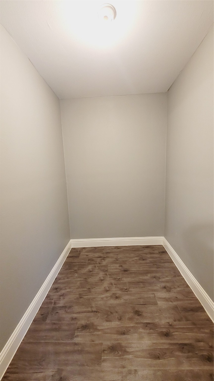 4034 Dreyfus Street Houston, TX 77021 - Photo 10 of 32 a view of an empty room and wooden floor