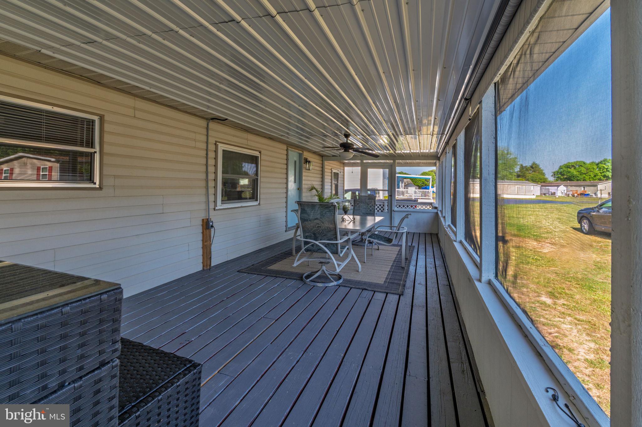 35401 Mallard Road Millsboro, DE 19966 - Photo 3 of 23 a view of deck with patio