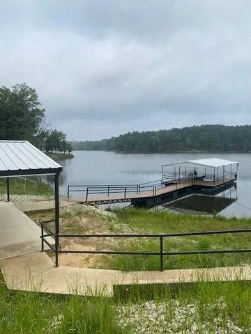 a view of a lake with a big yard