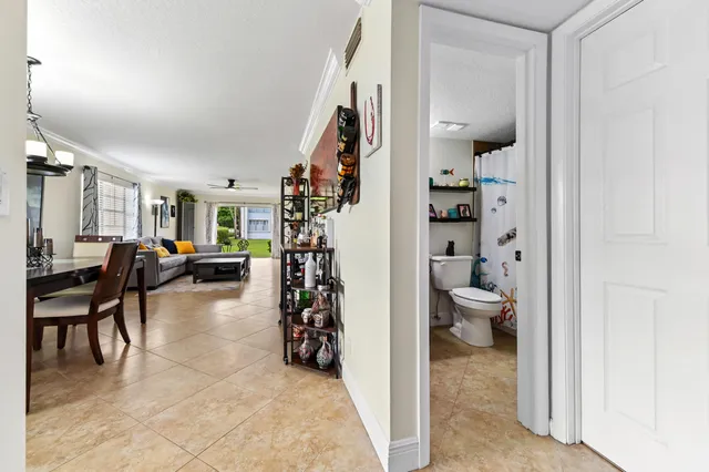 a living room with furniture and a area