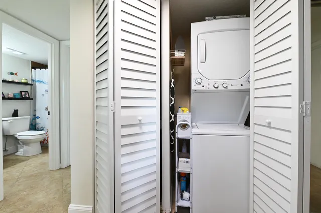 a view of bathroom with a toilet and a shower