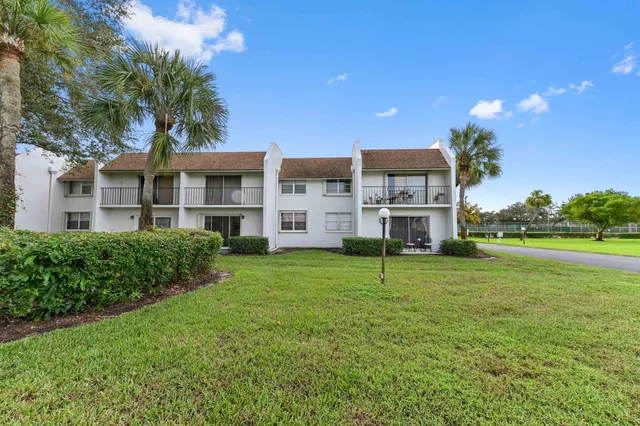 a house view with a garden space