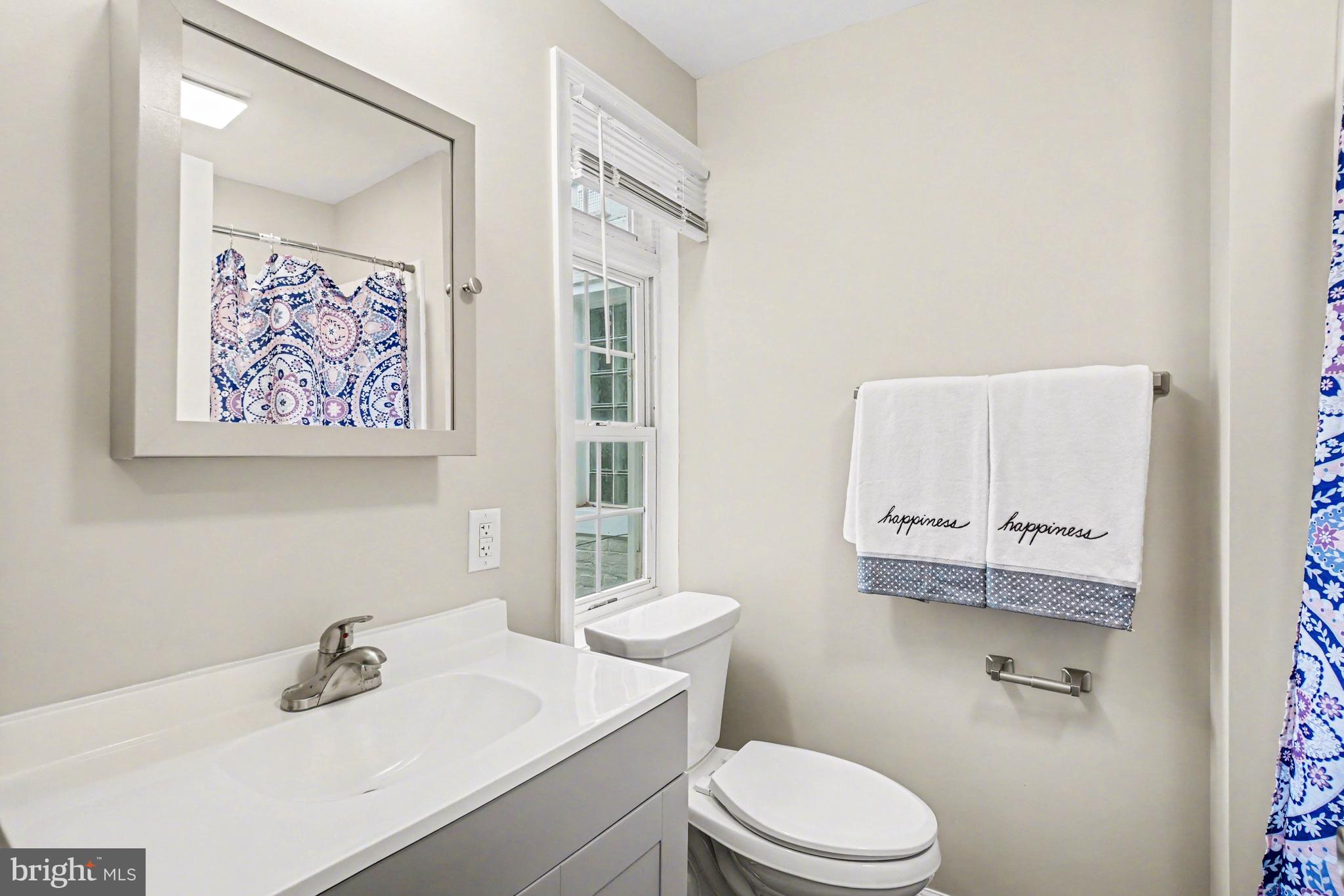 305 South 9th Street Lebanon, PA 17042 - Photo 18 of 24 a white toilet sitting next to a bathroom sink