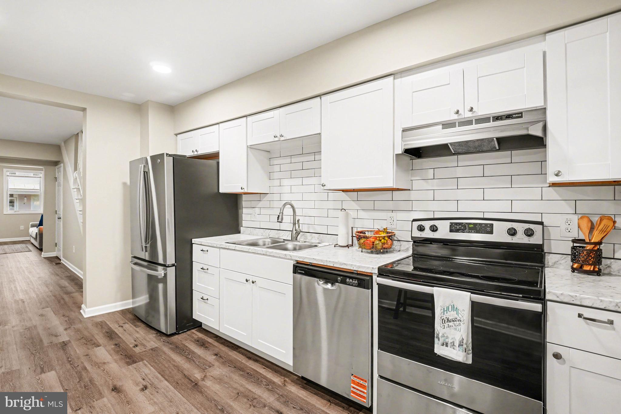 305 South 9th Street Lebanon, PA 17042 - Photo 7 of 24 a kitchen with stainless steel appliances a stove microwave and a refrigerator