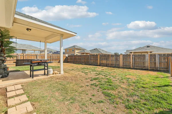 a front view of a house with a patio