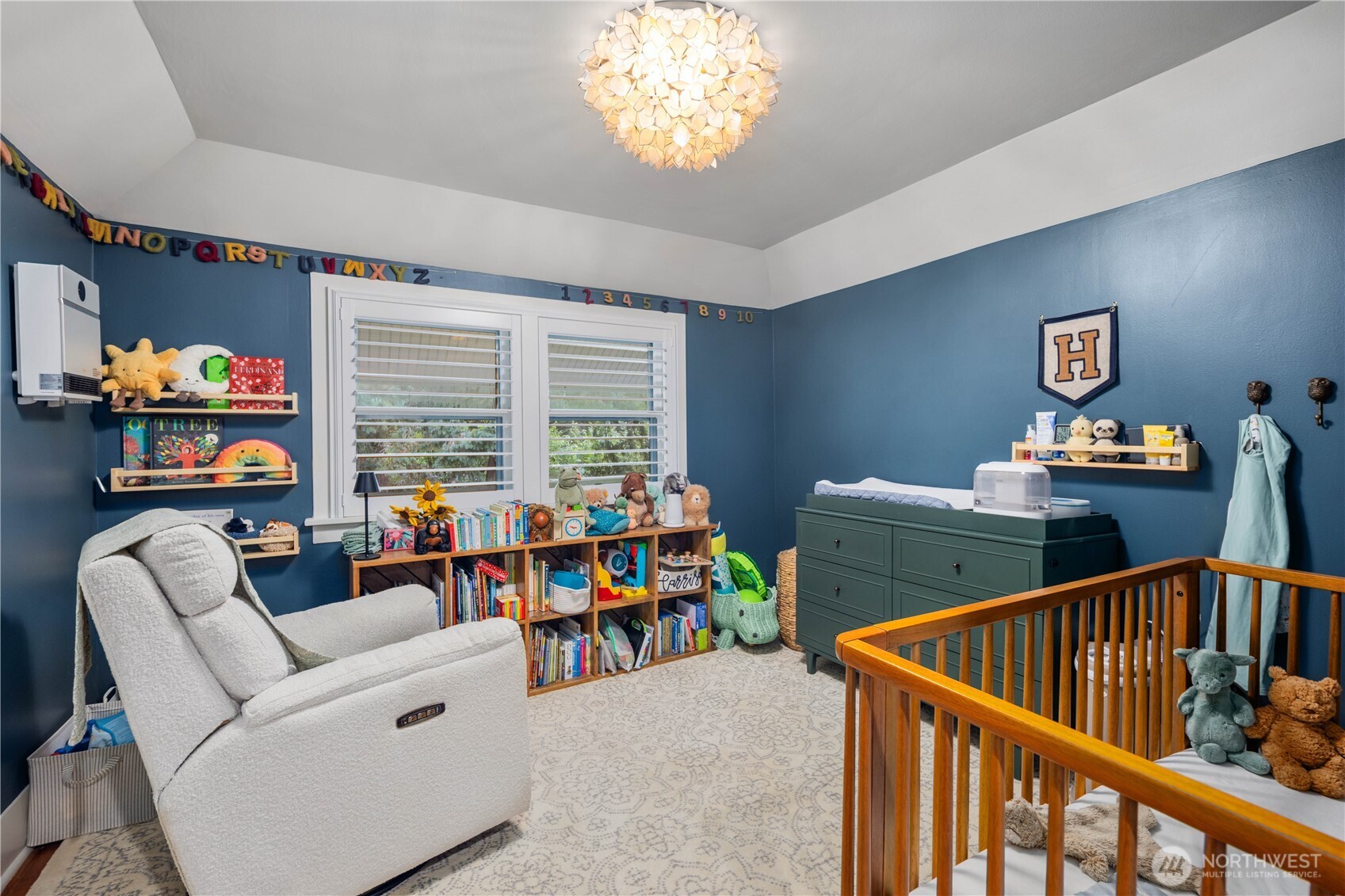 641 Northwest 175th Street Shoreline, WA 98177 - Photo 21 of 40 a bedroom with furniture and a window