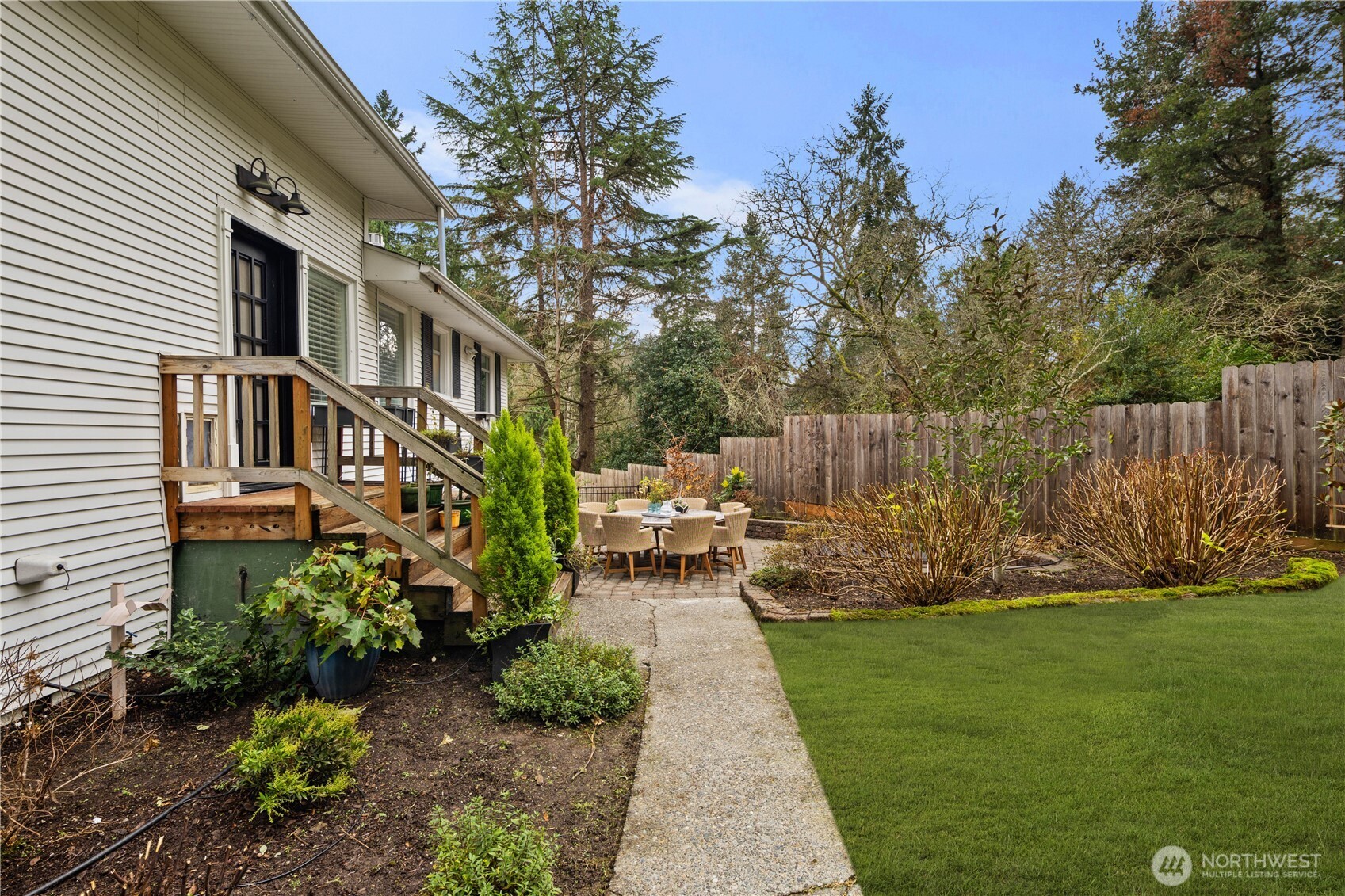 641 Northwest 175th Street Shoreline, WA 98177 - Photo 33 of 40 a view of yard in front of house with trees