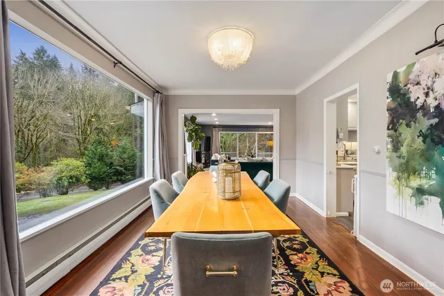 a kitchen with a sink a stove cabinets and counter space