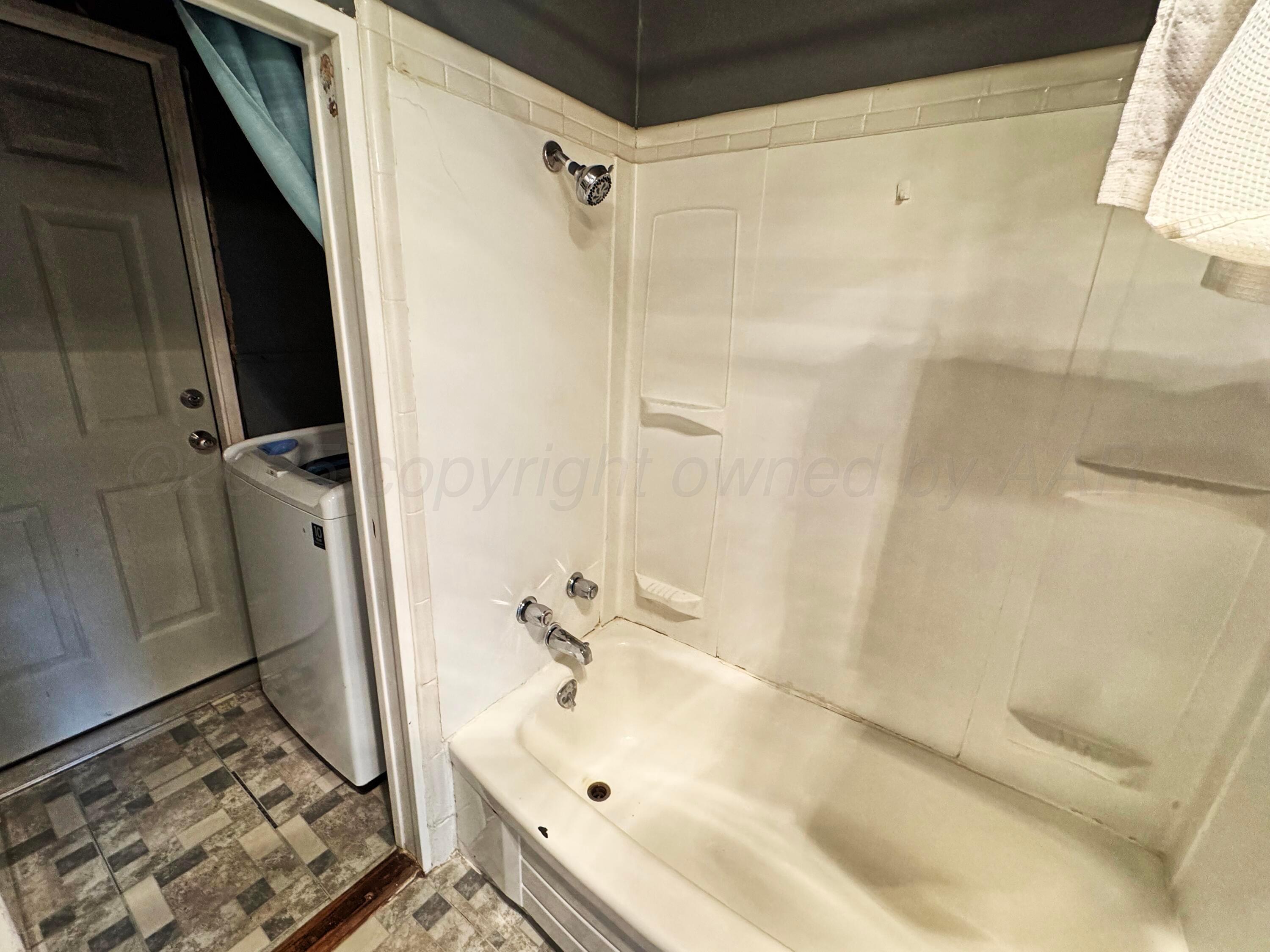 1813 South Colgate Street Perryton, TX 79070 - Photo 8 of 13 1813 bathroom 2