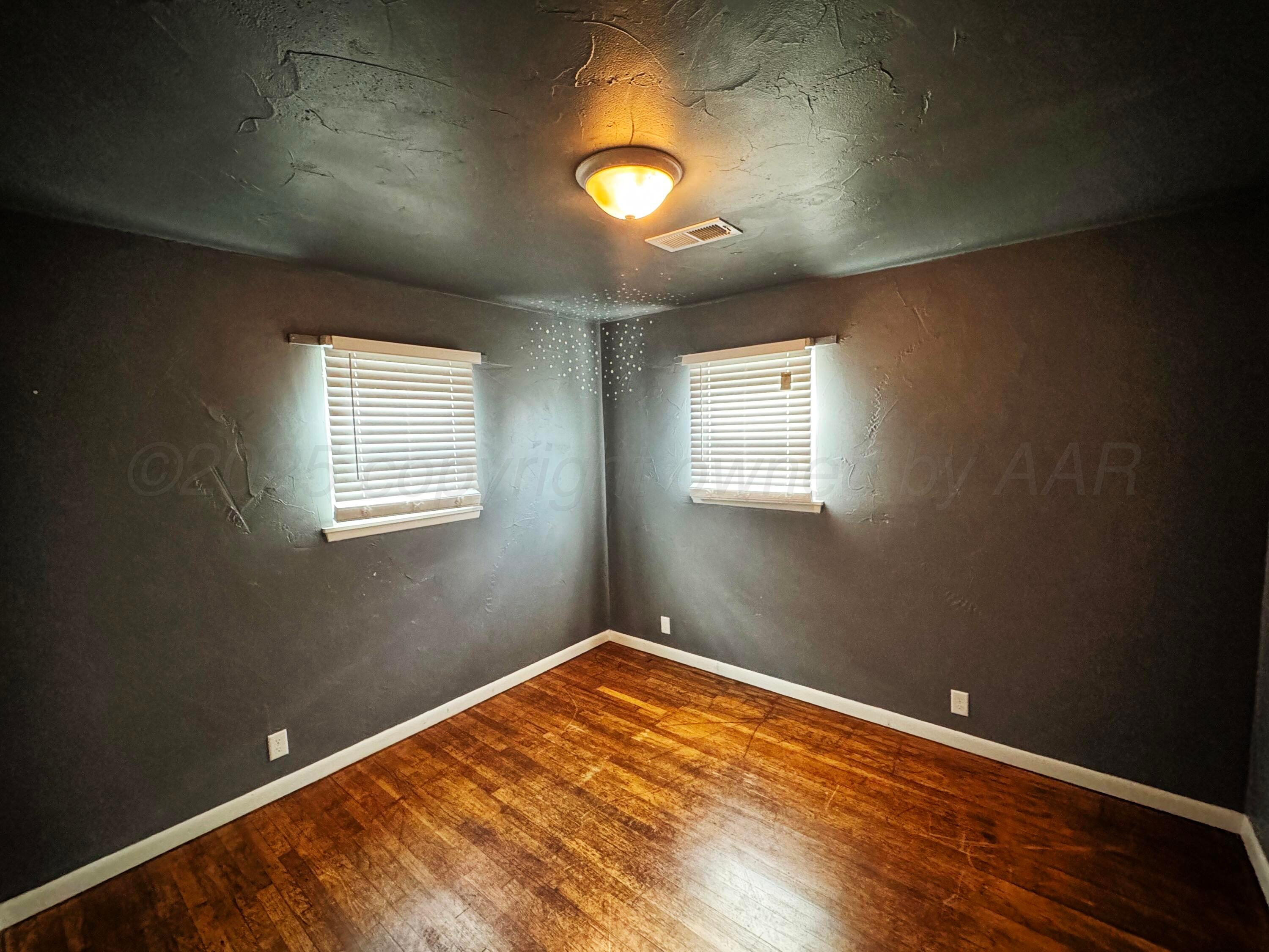1813 South Colgate Street Perryton, TX 79070 - Photo 9 of 13 1813 bedroom 3
