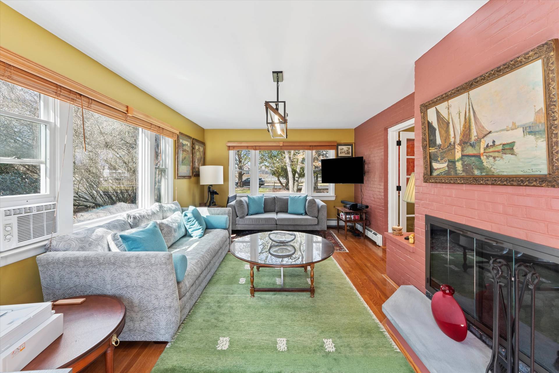 11 Oneck Road Westhampton Beach, NY 11978 - Photo 11 of 34 a living room with furniture fireplace and a large window