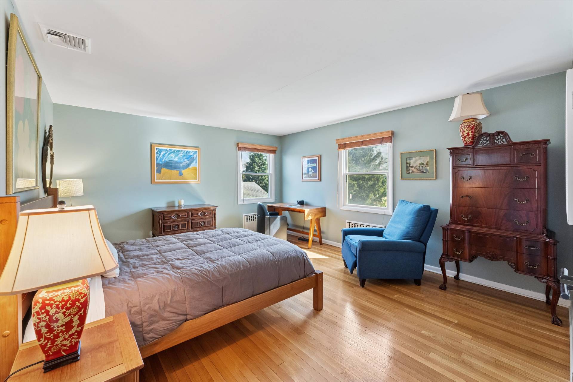 11 Oneck Road Westhampton Beach, NY 11978 - Photo 16 of 34 a bedroom with a bed and wooden floor