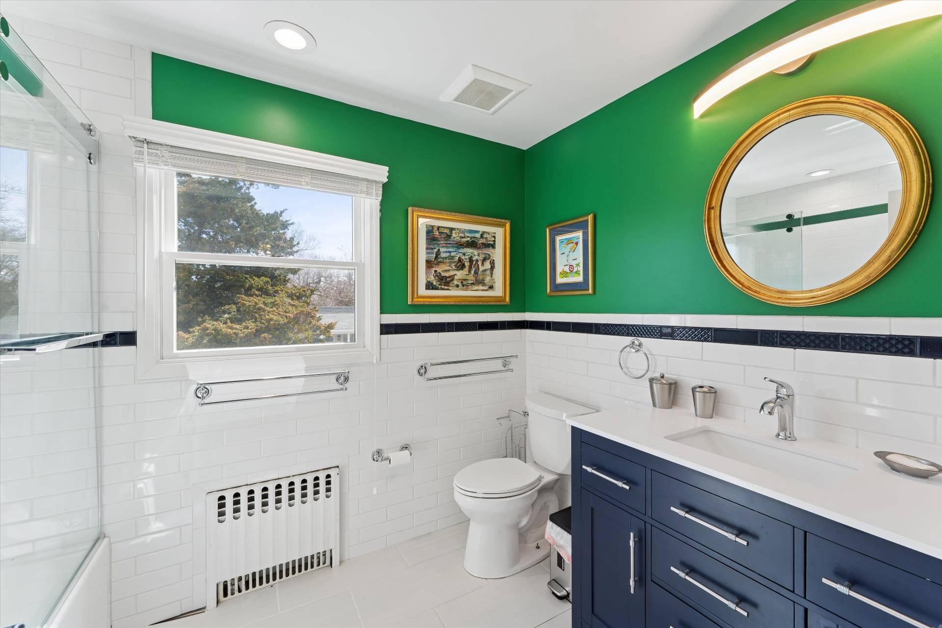 11 Oneck Road Westhampton Beach, NY 11978 - Photo 17 of 34 a bathroom with a toilet a sink and mirror