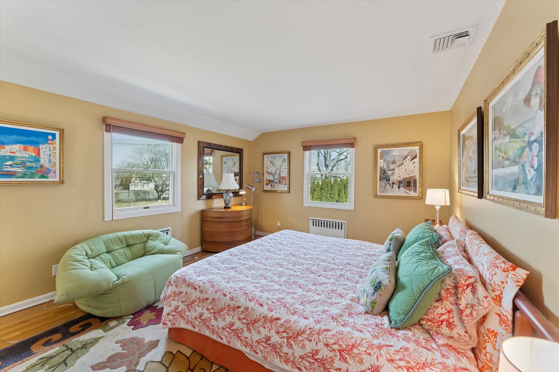 11 Oneck Road Westhampton Beach, NY 11978 - Photo 18 of 34 a bedroom with a bed and window