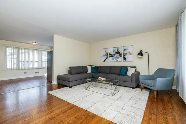 a living room with furniture and a couch