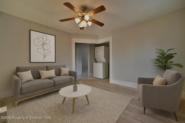 a living room with furniture and a couch
