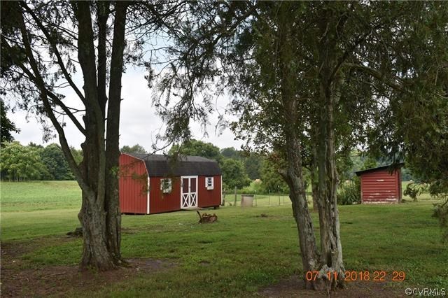 2075 Jonesboro Road Kenbridge, VA 23944 - Photo 23 of 27 a view of a trees front of a house