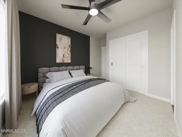 a bedroom with a bed and window