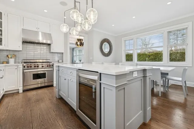 a living room with furniture fireplace and flat screen tv