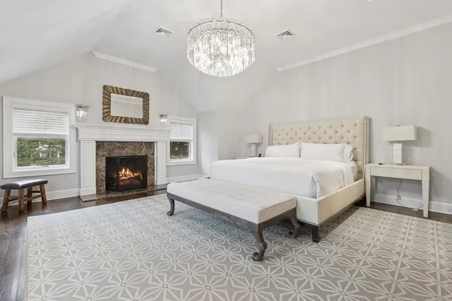 a bathroom with a shower toilet and sink
