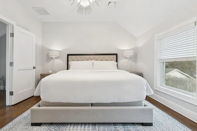 a bathroom with a sink double vanity and a tub