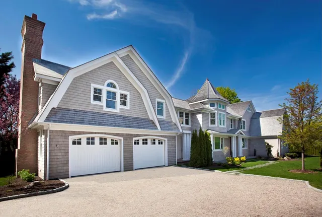 a front view of building with yard