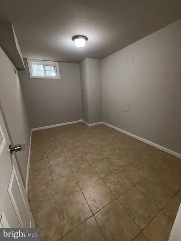 a view of entryway with kitchen