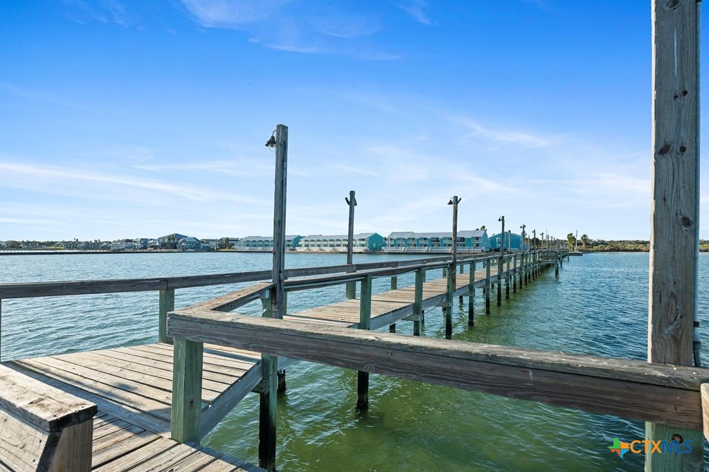 2292 North Fulton Beach Road, Unit 505 Rockport, TX 78382 - Photo 46 of 46 a view of a lake from a balcony