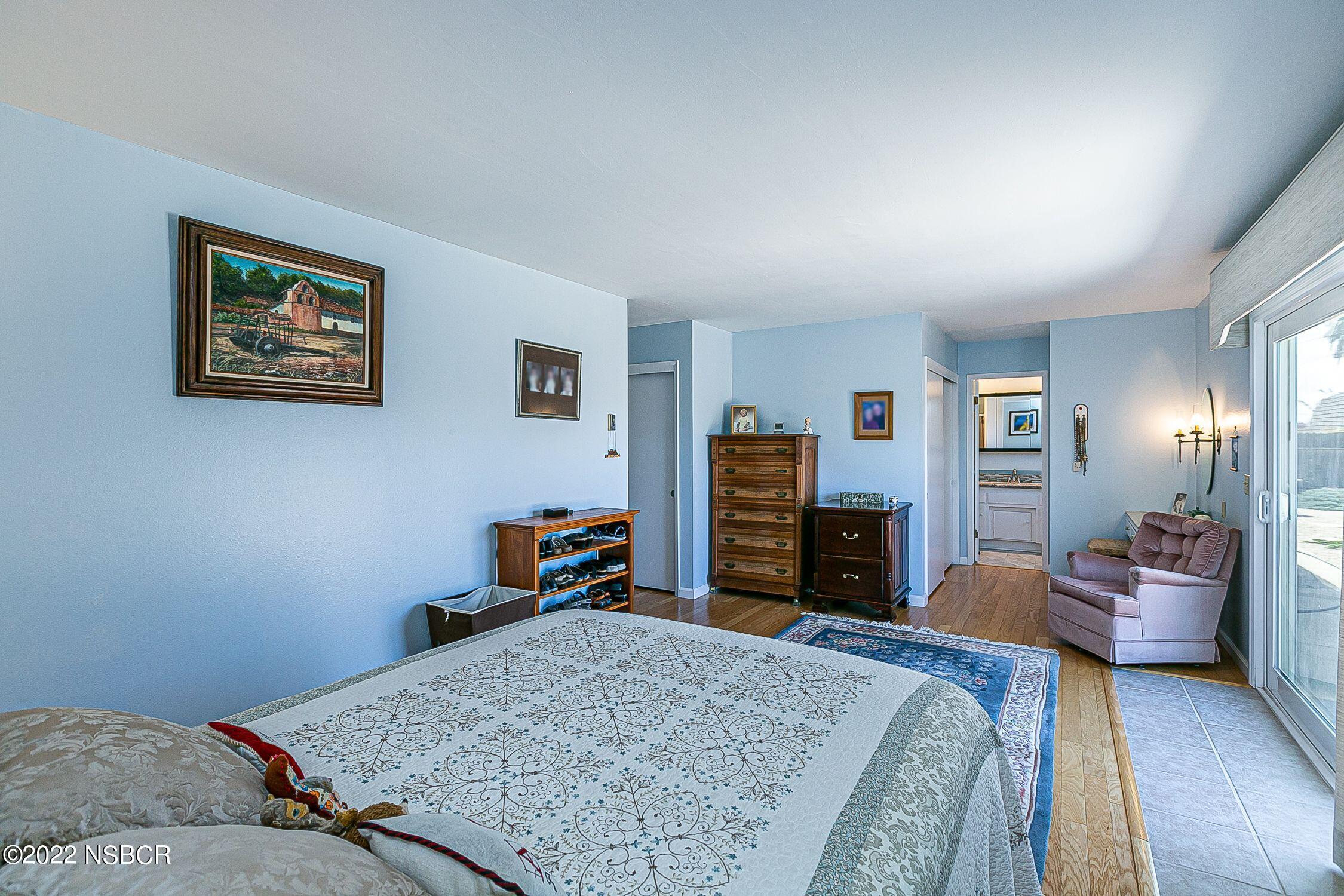 4212 Centaur Avenue Lompoc, CA 93436 - Photo 20 of 30 a bedroom with a bed and dresser