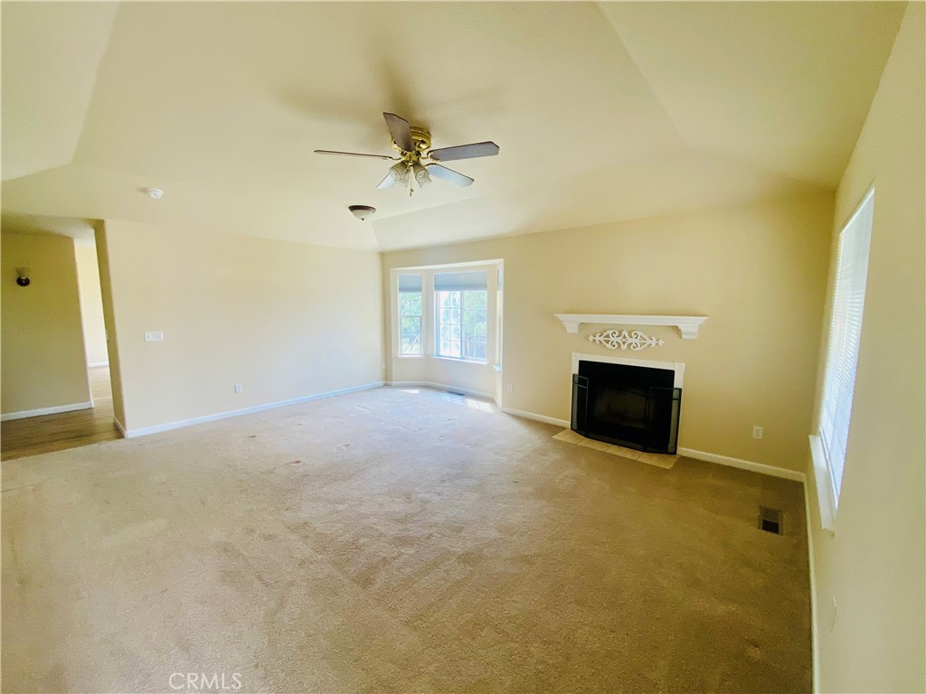 16506 Ridgecrest Court Hidden Valley Lake, CA 95467 - Photo 2 of 25 a view of empty room with fireplace